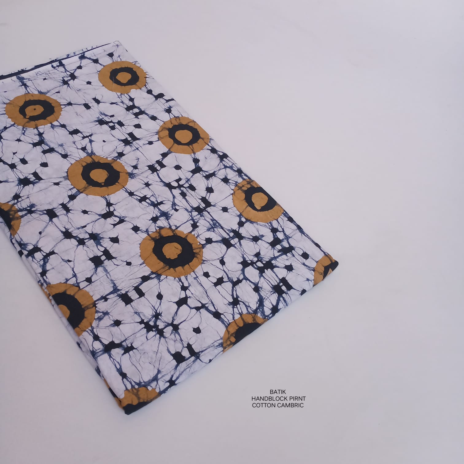 Pure cotton batik fabric wholesale in mustard, handcrafted batik print fabric for boutique, designer & bulk buyers – Fabtexs